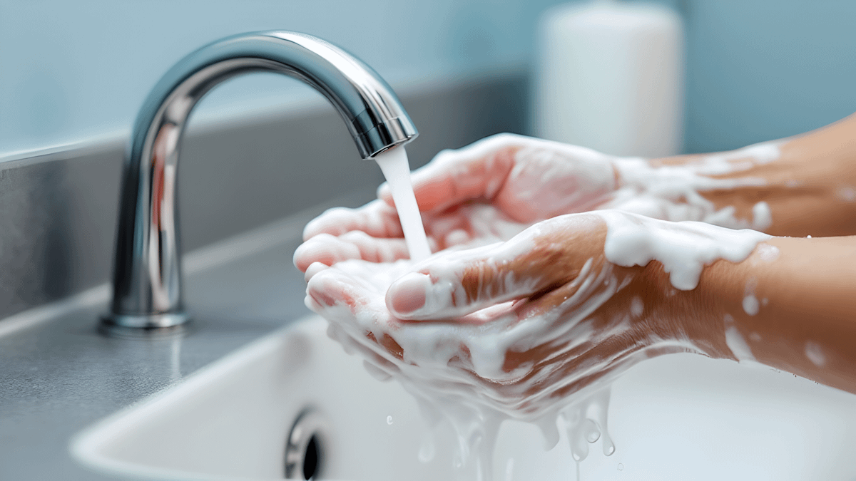 A surgeon washing their hands