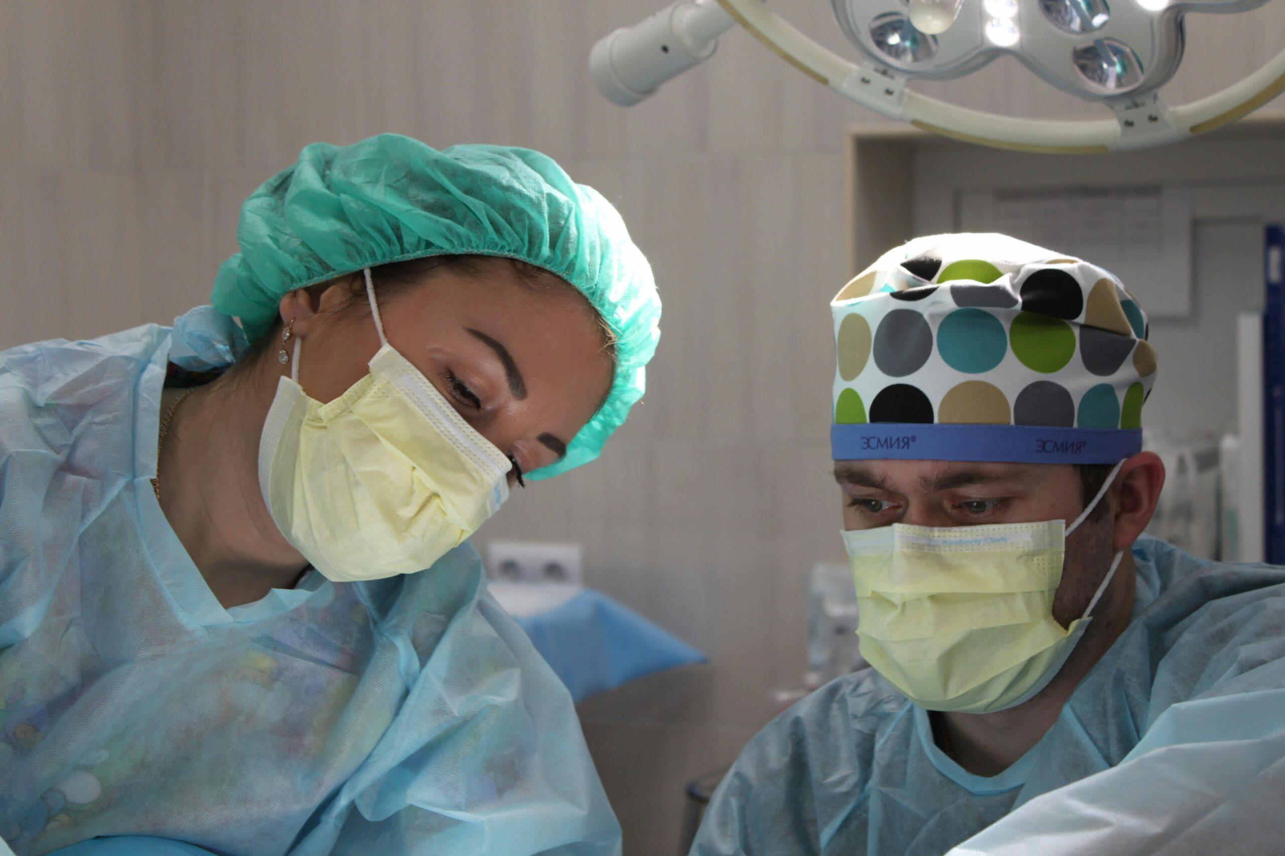doctors performing surgery