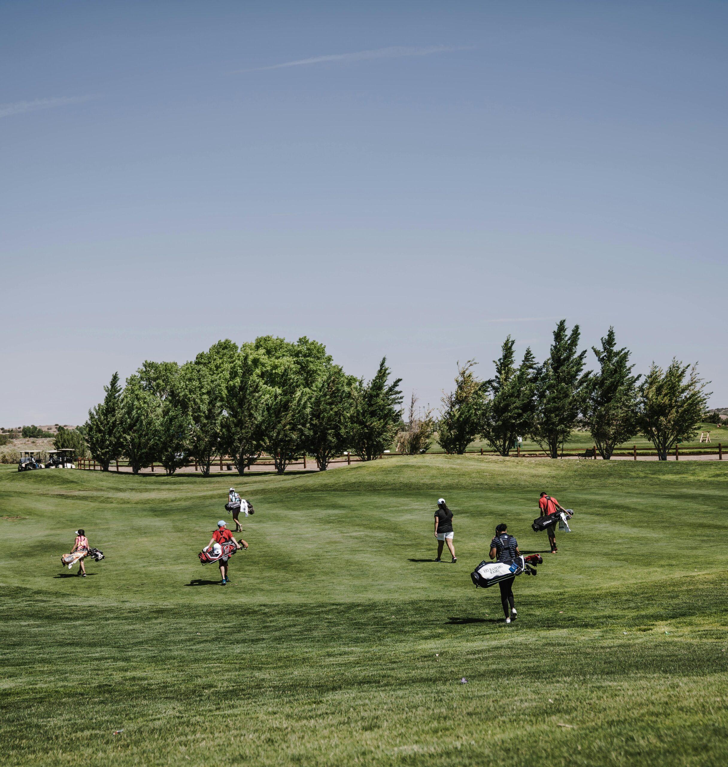 golfers on the green