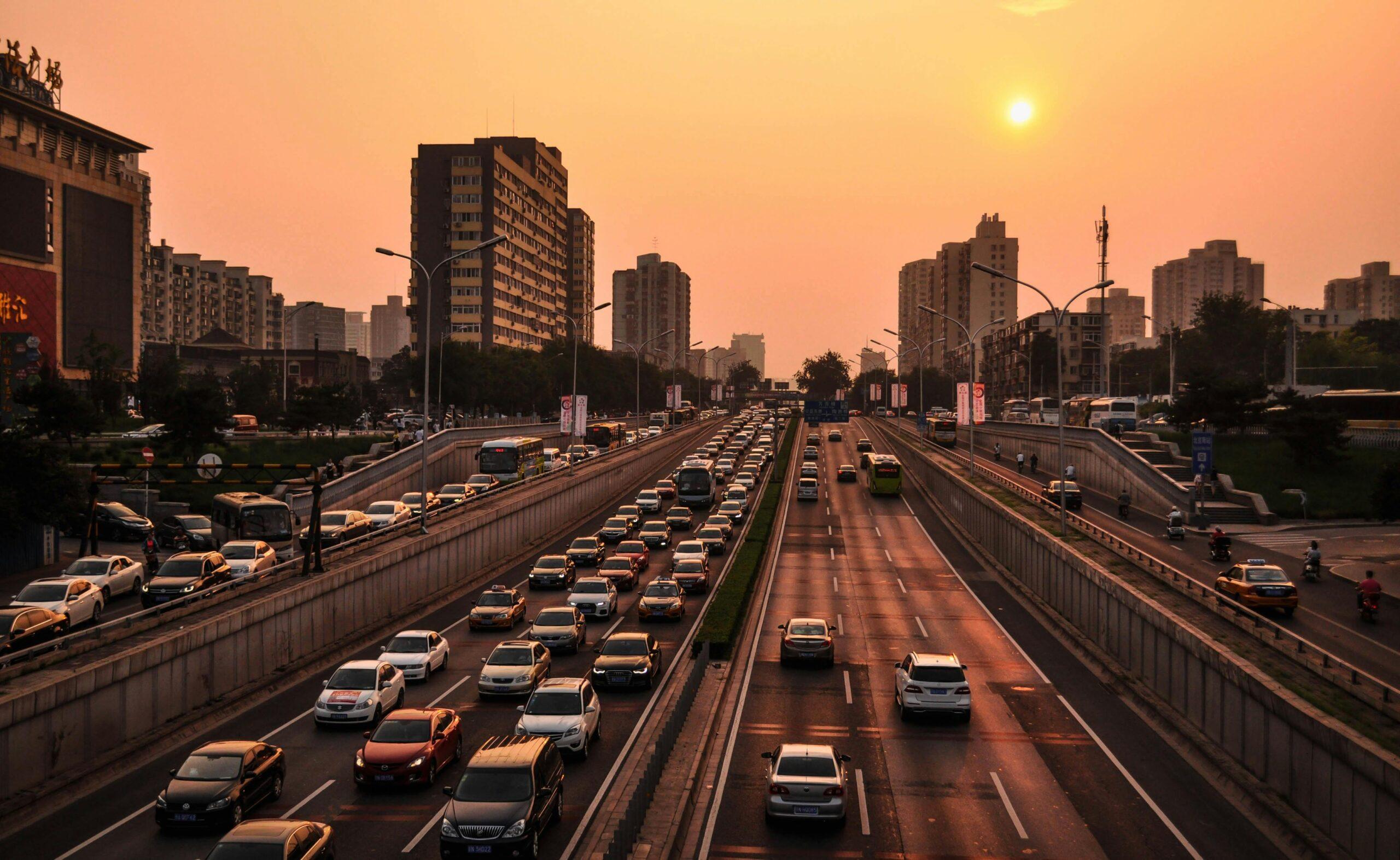 cars driving at sunset