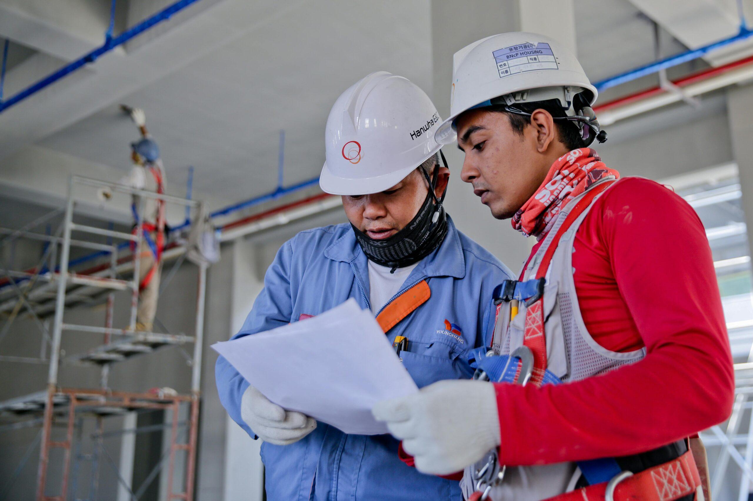 construction workers talking