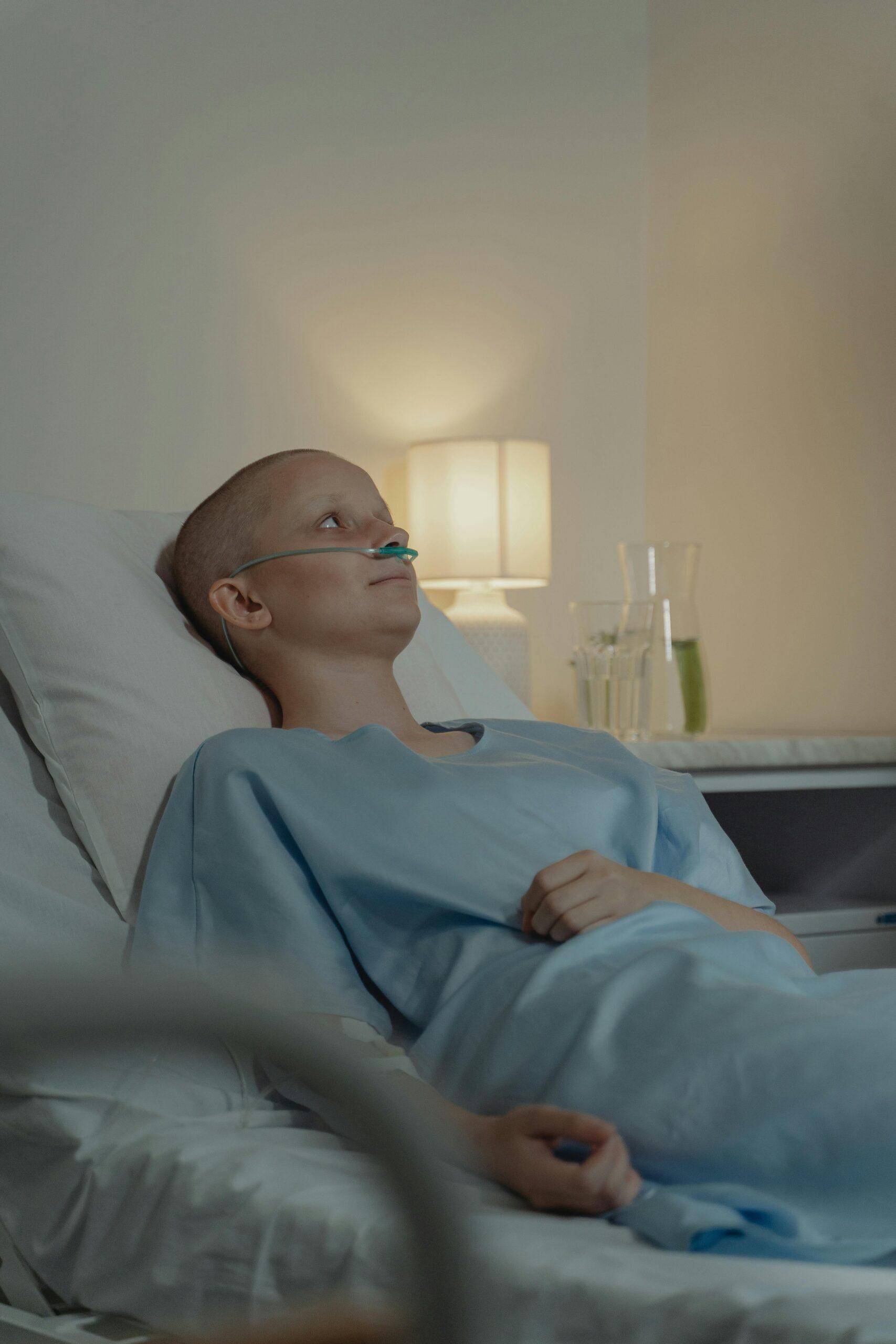 sick woman in hospital bed